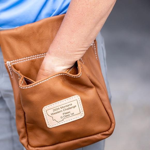 Reaching into a bag for shotgun shells